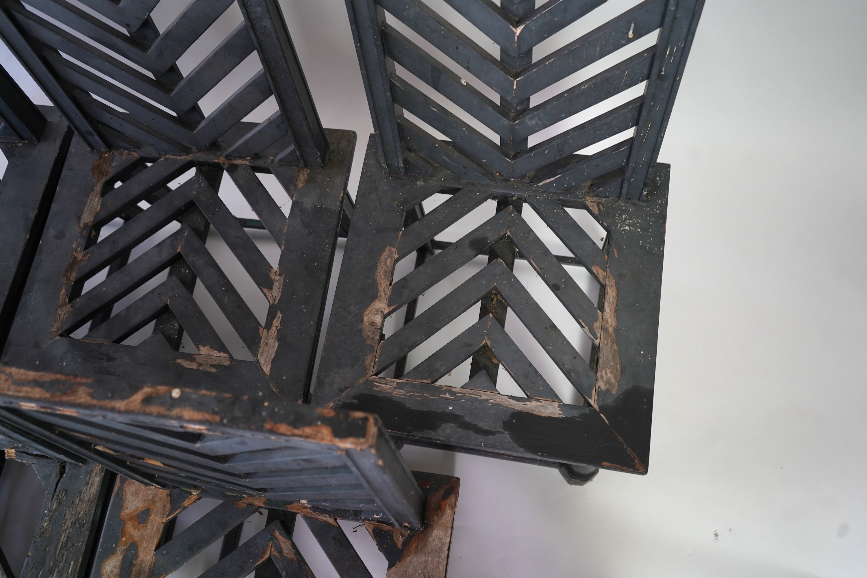 A set of fourteen green painted beech garden chairs, designed by Emilio Terry for the Theatre de Verdue, Chateau De Groussay